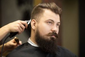 young-bearded-man-hairdresser-salon