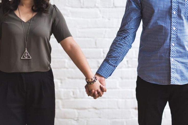 couple-together-holding-hands